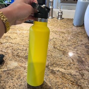Yellow 24 oz hydro flask with 2 lids